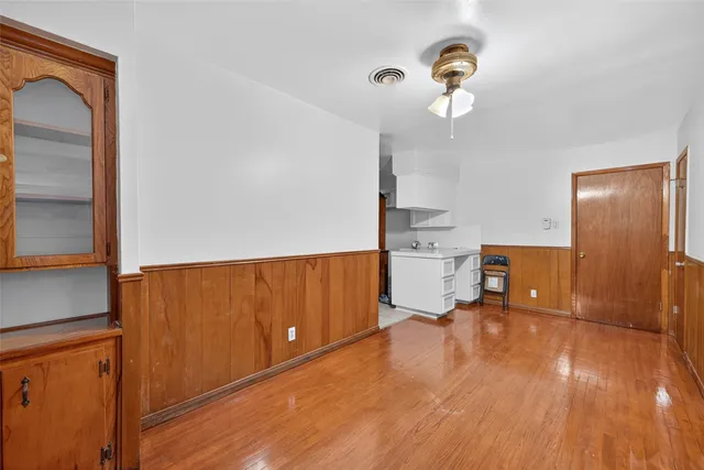 a bathroom with a sink a mirror and a toilet