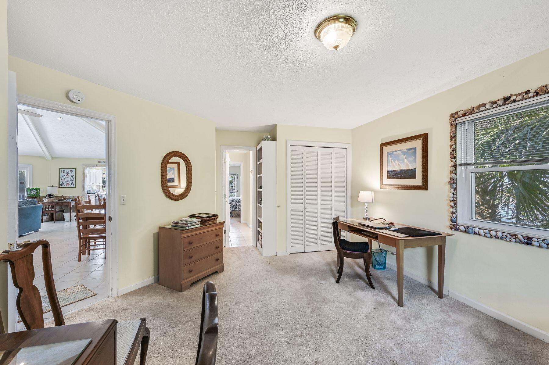 169 Pompano Street Inlet Beach, FL 32461 - Photo 16 of 49 a living room with furniture and a window