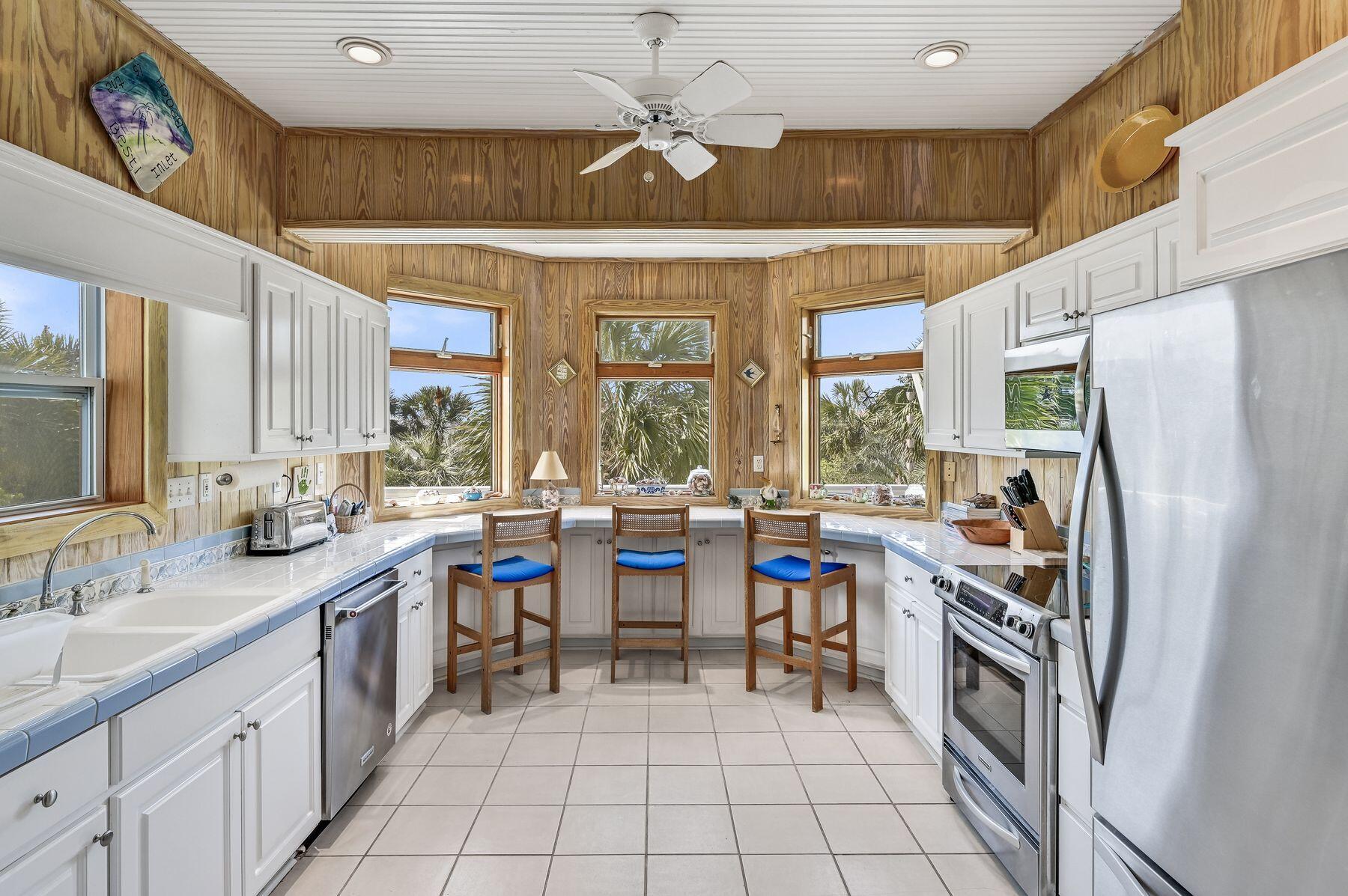 169 Pompano Street Inlet Beach, FL 32461 - Photo 20 of 49 a kitchen with lots of counter top space