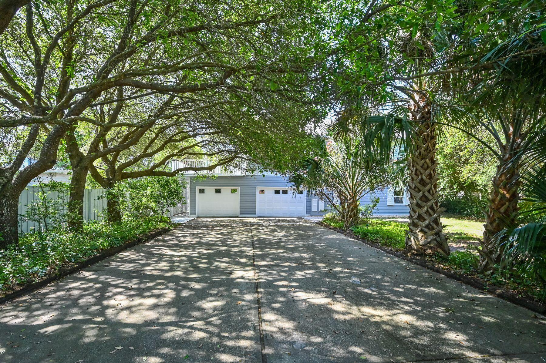 169 Pompano Street Inlet Beach, FL 32461 - Photo 2 of 49 a house with a tree in front of it