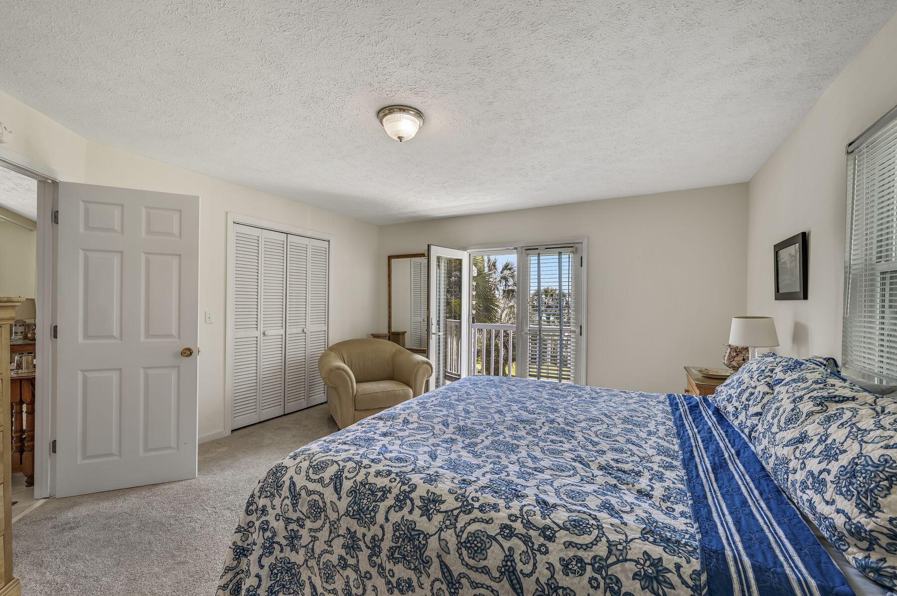 169 Pompano Street Inlet Beach, FL 32461 - Photo 24 of 49 a bedroom with a large bed and a window