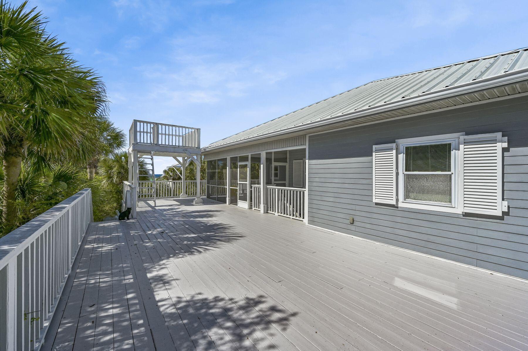 169 Pompano Street Inlet Beach, FL 32461 - Photo 33 of 49 a front view of a house with a yard