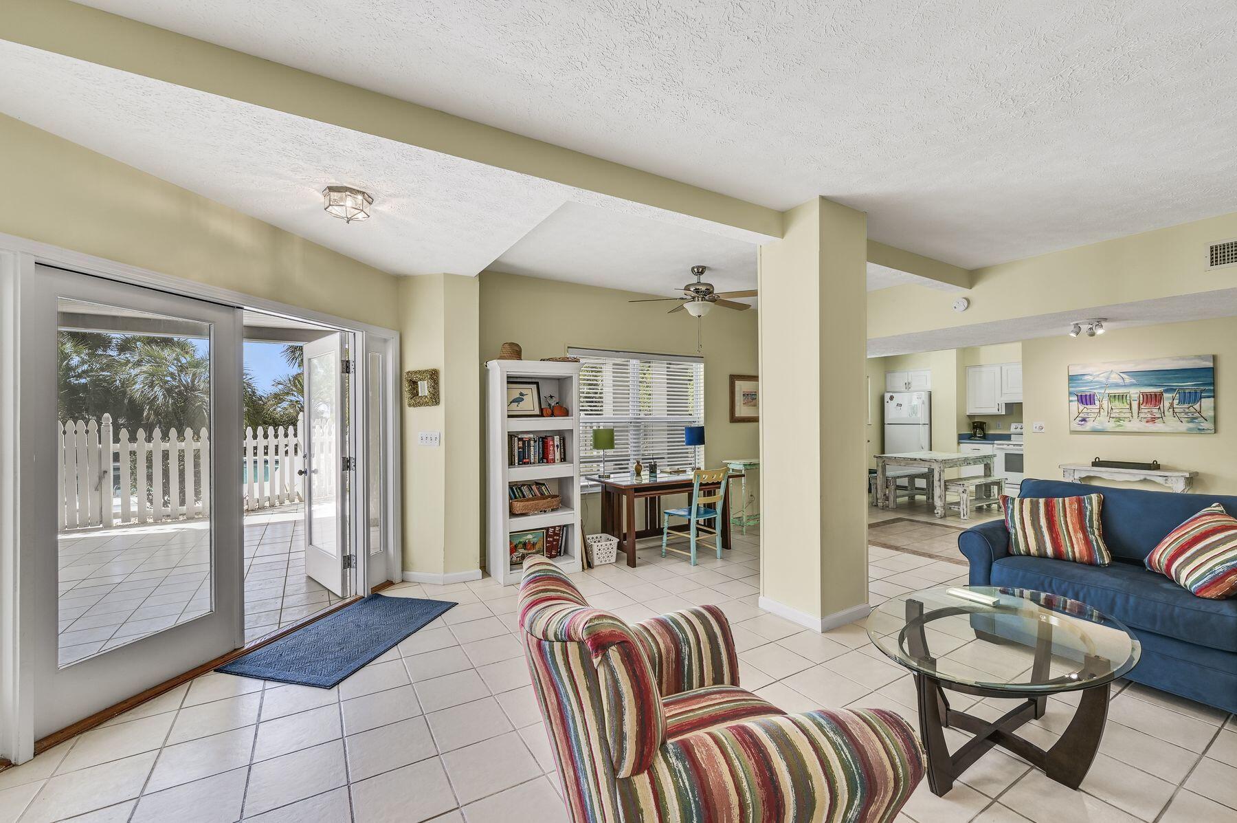 169 Pompano Street Inlet Beach, FL 32461 - Photo 36 of 49 a living room with furniture and a large window