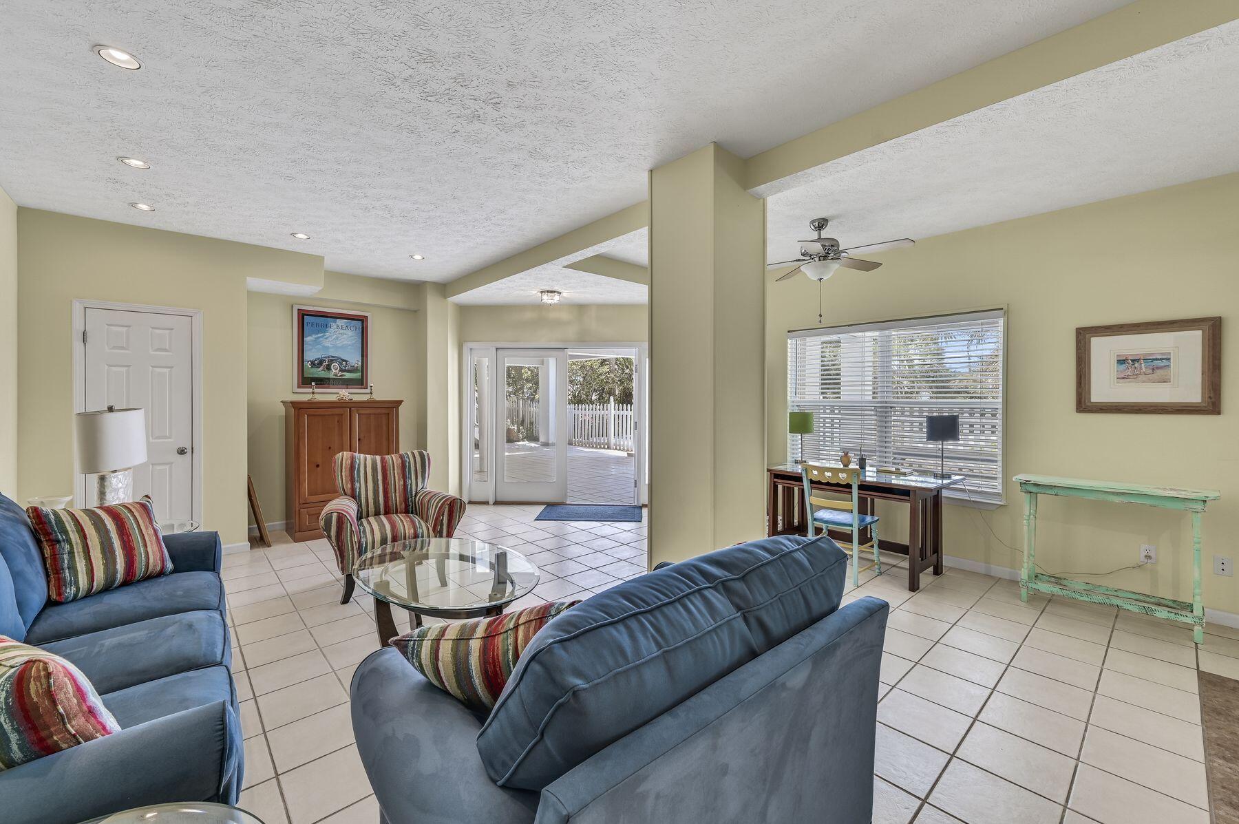 169 Pompano Street Inlet Beach, FL 32461 - Photo 38 of 49 a living room with furniture and a table