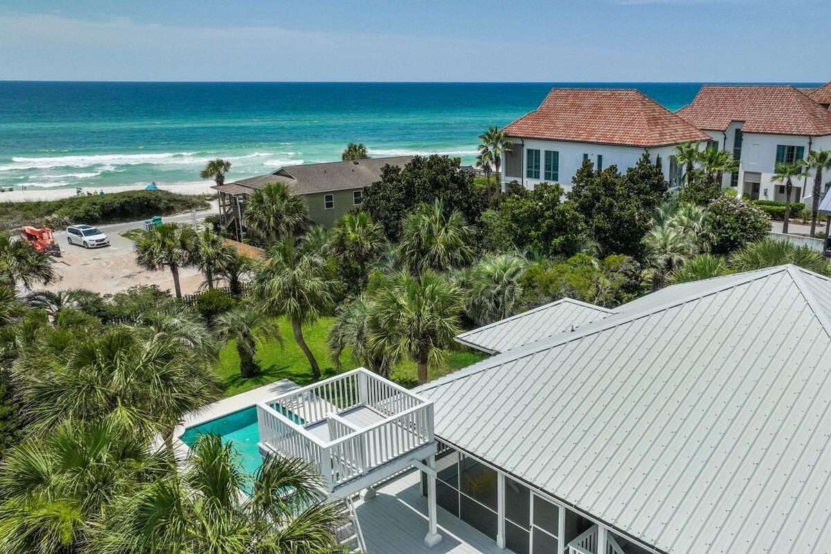 169 Pompano Street Inlet Beach, FL 32461 - Photo 4 of 49 an aerial view of a house with garden space and outdoor seating