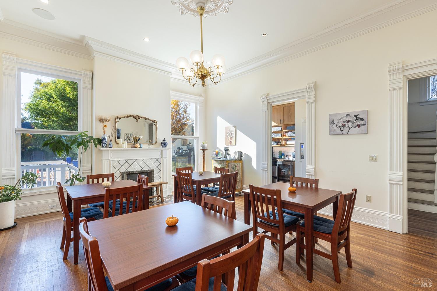 423 Seminary Street Napa, CA 94559 - Photo 13 of 35 a view of a dining room with furniture window and wooden floor