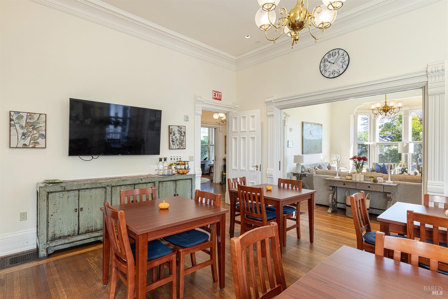423 Seminary Street Napa, CA 94559 - Photo 15 of 35 a view of a dining room with furniture window and wooden floor