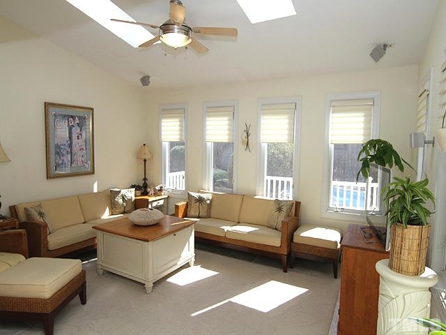 11800 Pembridge Lane Raleigh, NC 27613 - Photo 8 of 25 a living room with furniture and a large window
