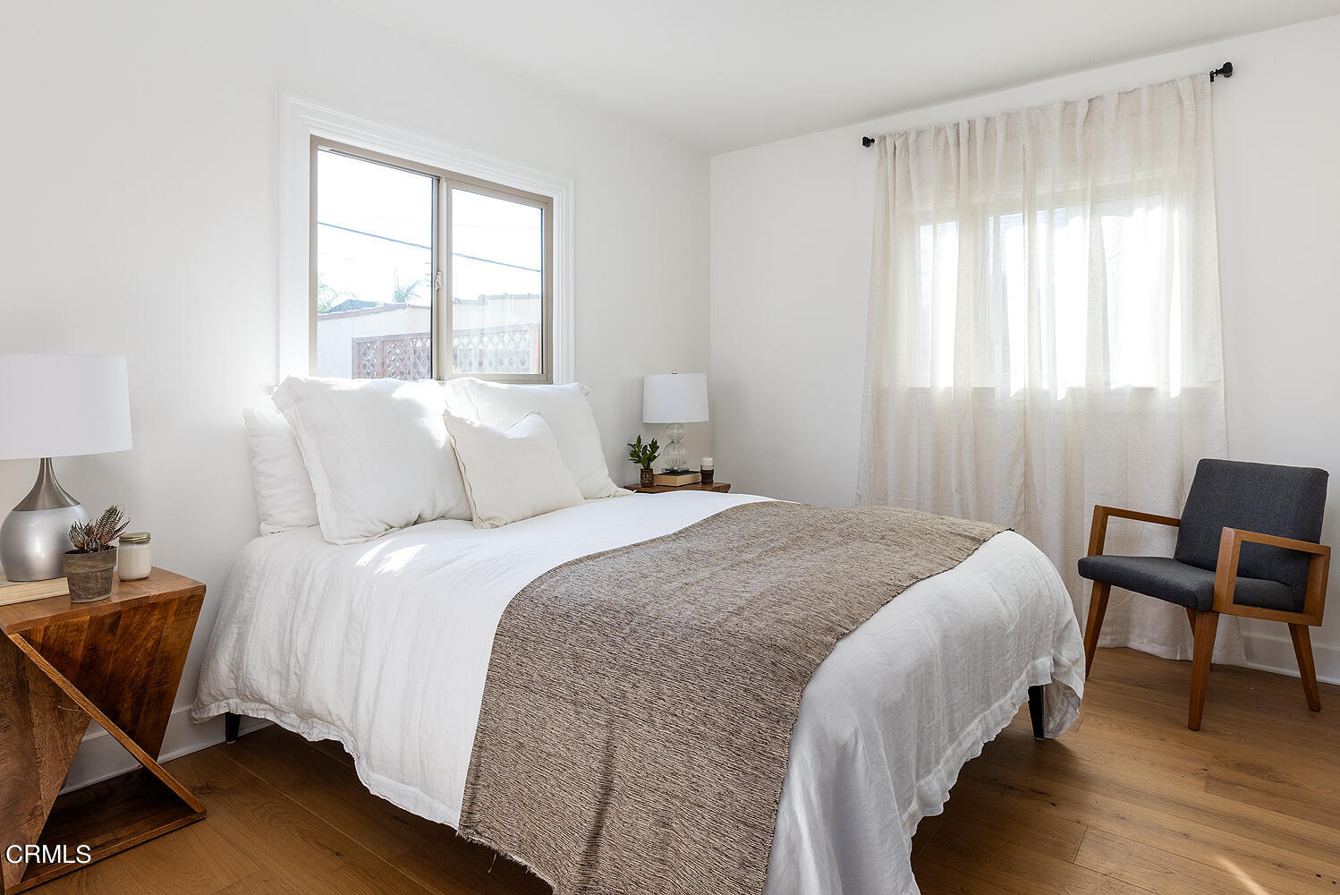 738 Burchett Street Glendale, CA 91202 - Photo 17 of 41 a bedroom with bed and window