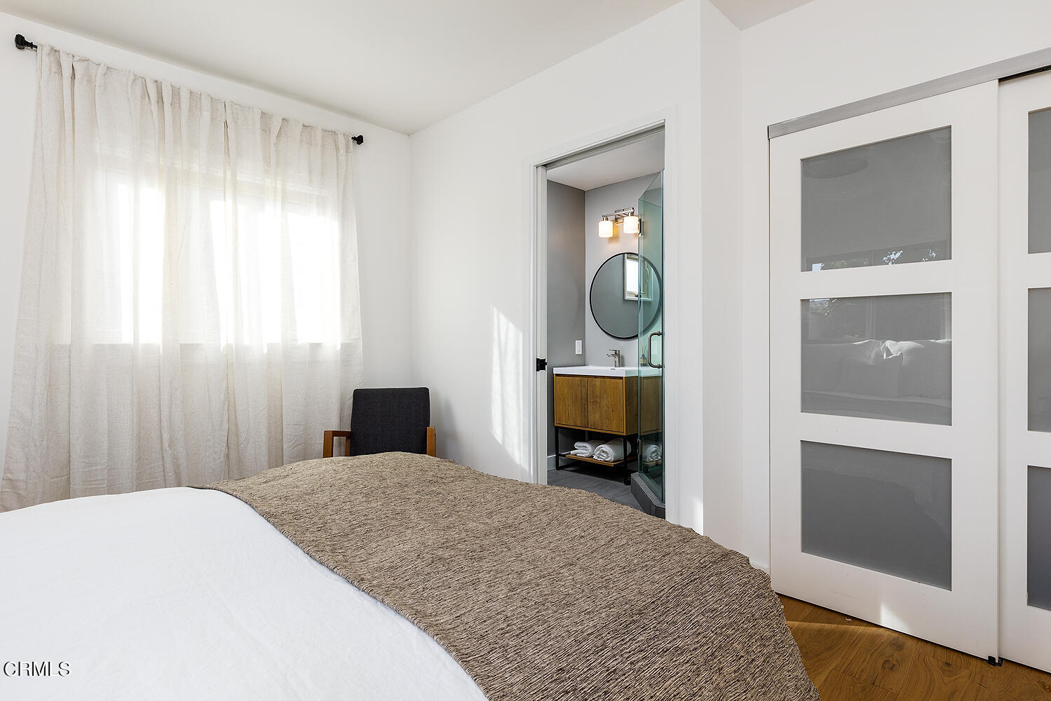 738 Burchett Street Glendale, CA 91202 - Photo 18 of 41 a bedroom with a bed and a television