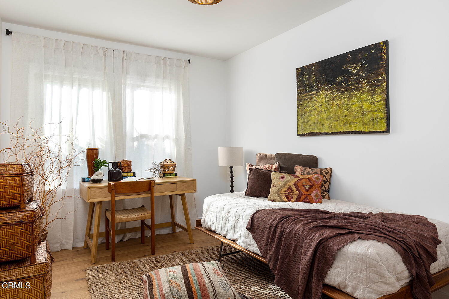 738 Burchett Street Glendale, CA 91202 - Photo 20 of 41 a bedroom with a bed and wooden floor