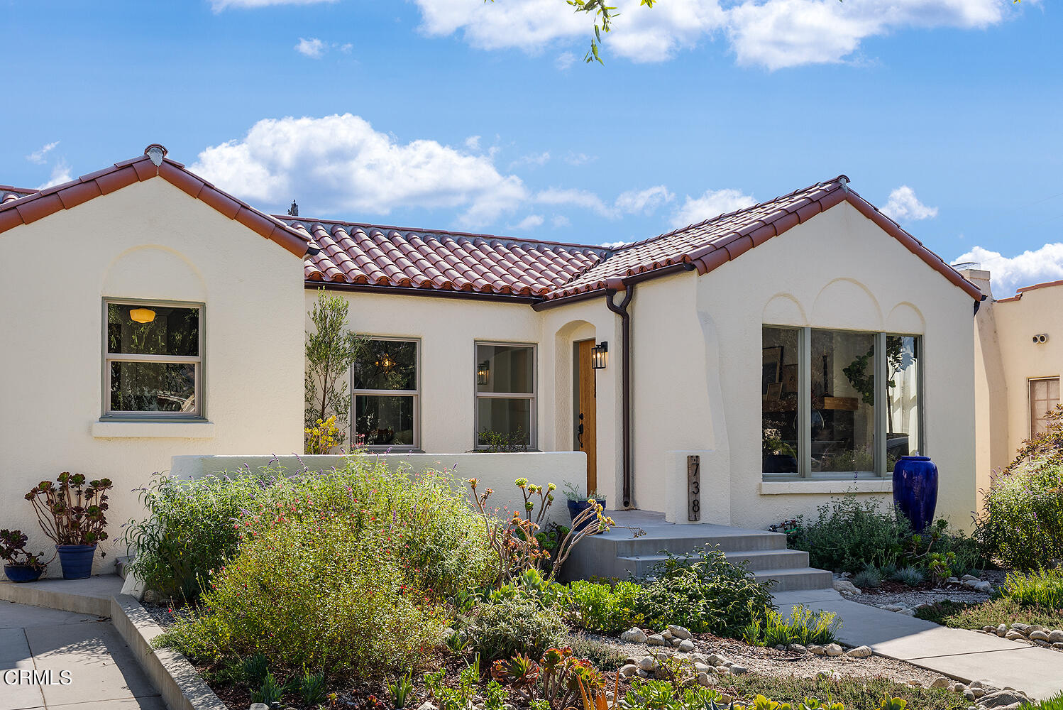 738 Burchett Street Glendale, CA 91202 - Photo 2 of 41 a front view of a house with garden