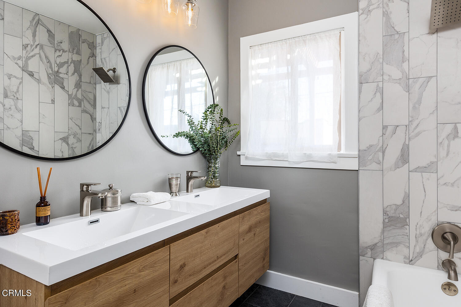 738 Burchett Street Glendale, CA 91202 - Photo 21 of 41 a bathroom with a sink and a mirror