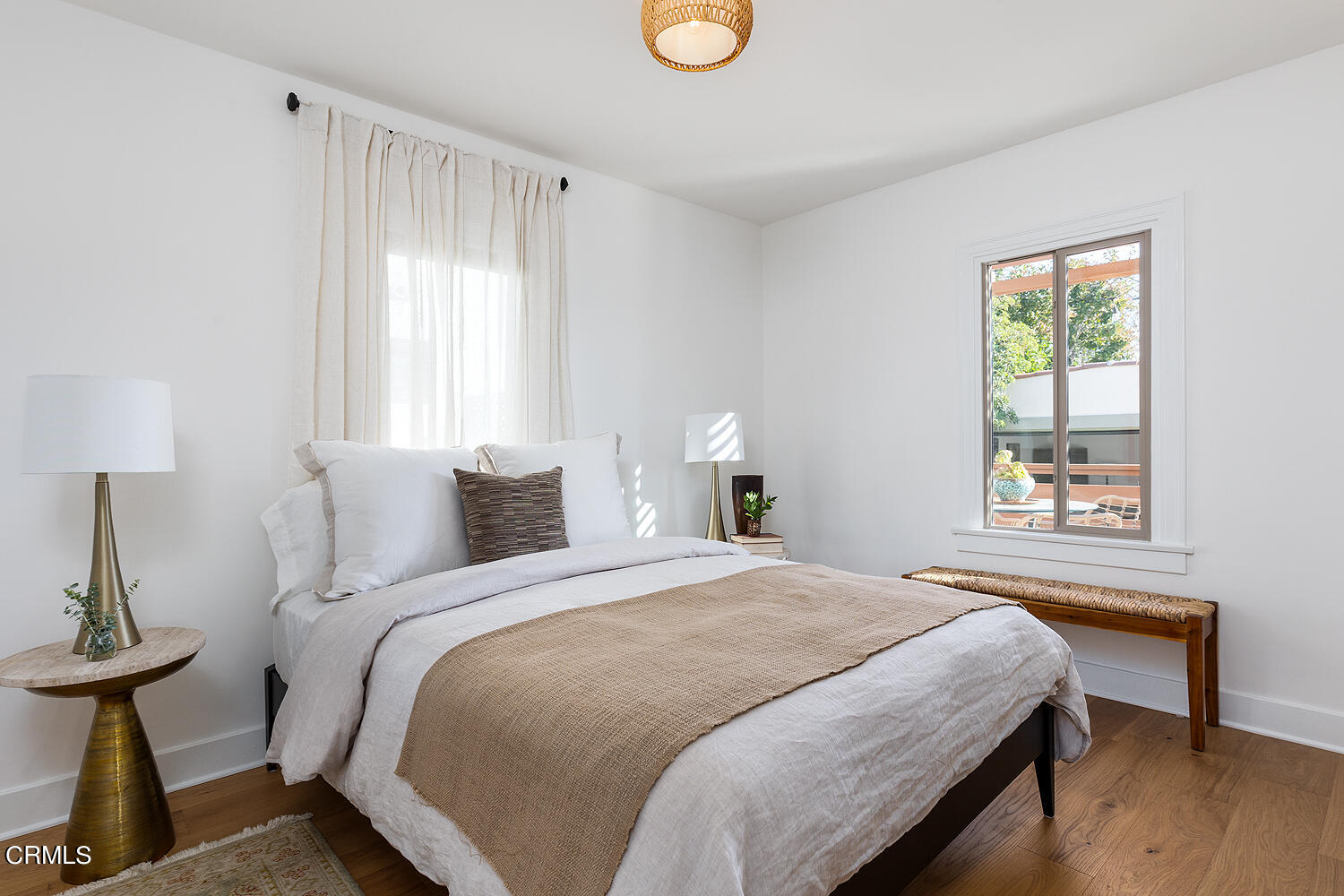 738 Burchett Street Glendale, CA 91202 - Photo 22 of 41 a bedroom with a bed and a window