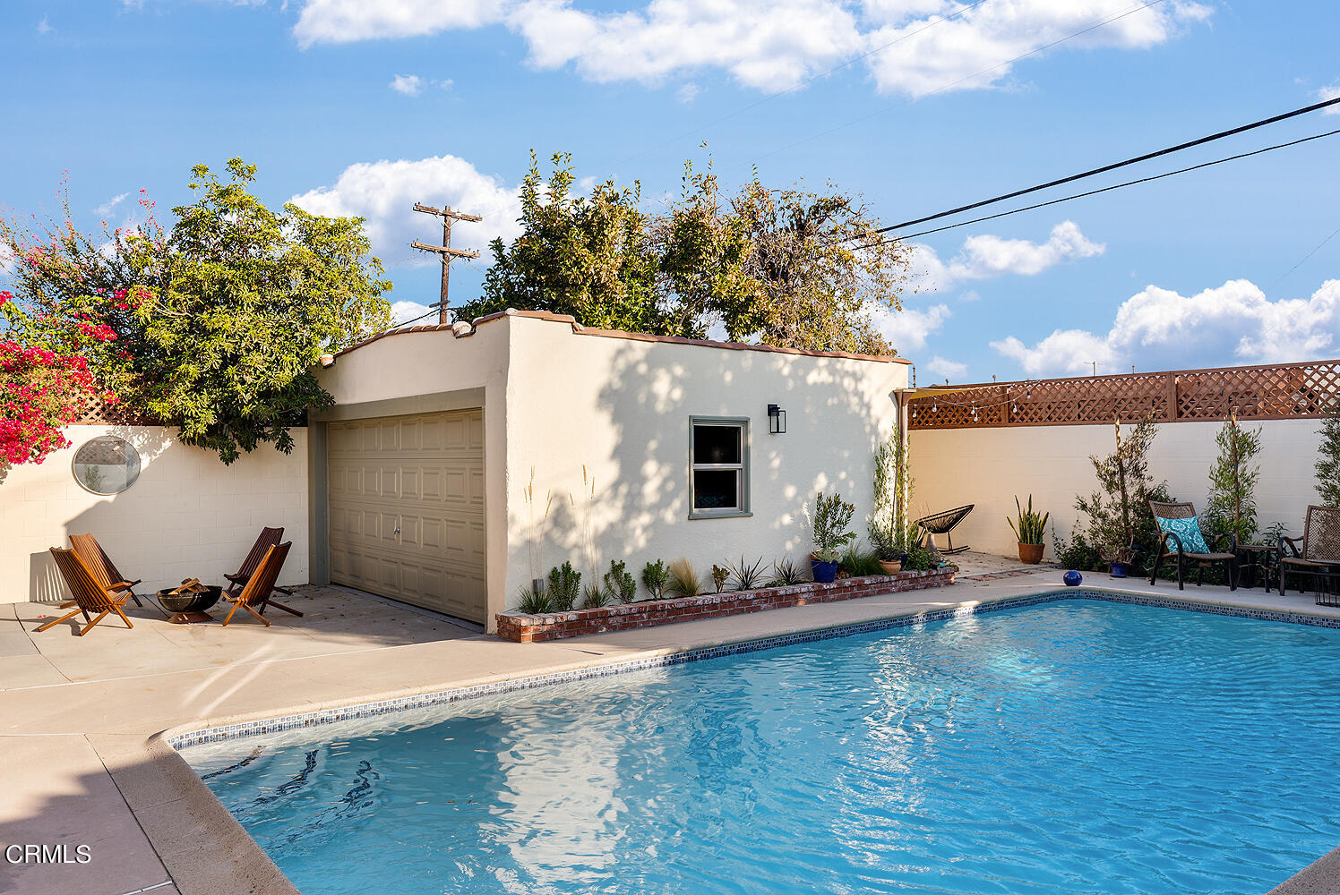 738 Burchett Street Glendale, CA 91202 - Photo 26 of 41 a view of a house with backyard and sitting area