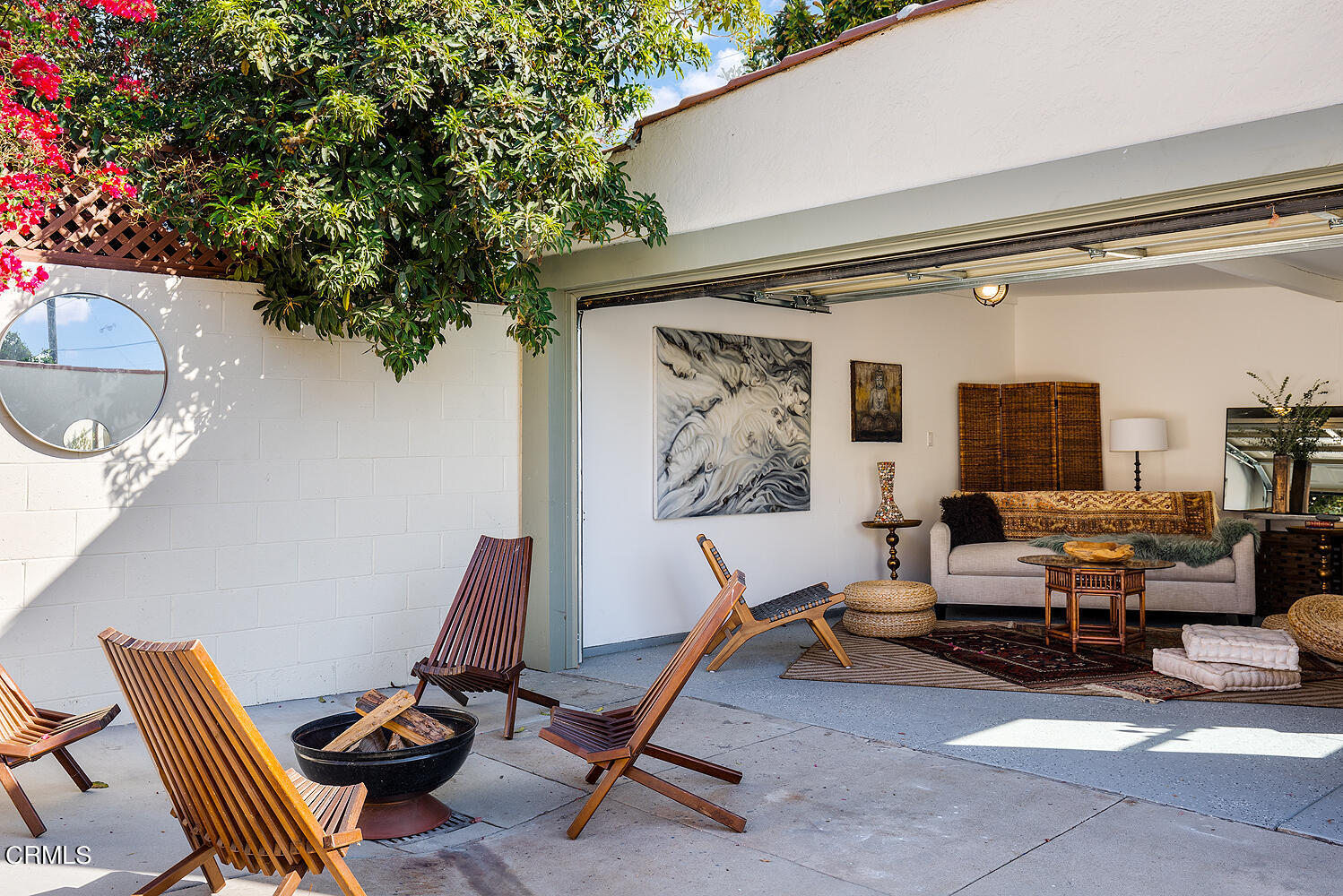 738 Burchett Street Glendale, CA 91202 - Photo 27 of 41 a living room with furniture a flat screen tv and a window