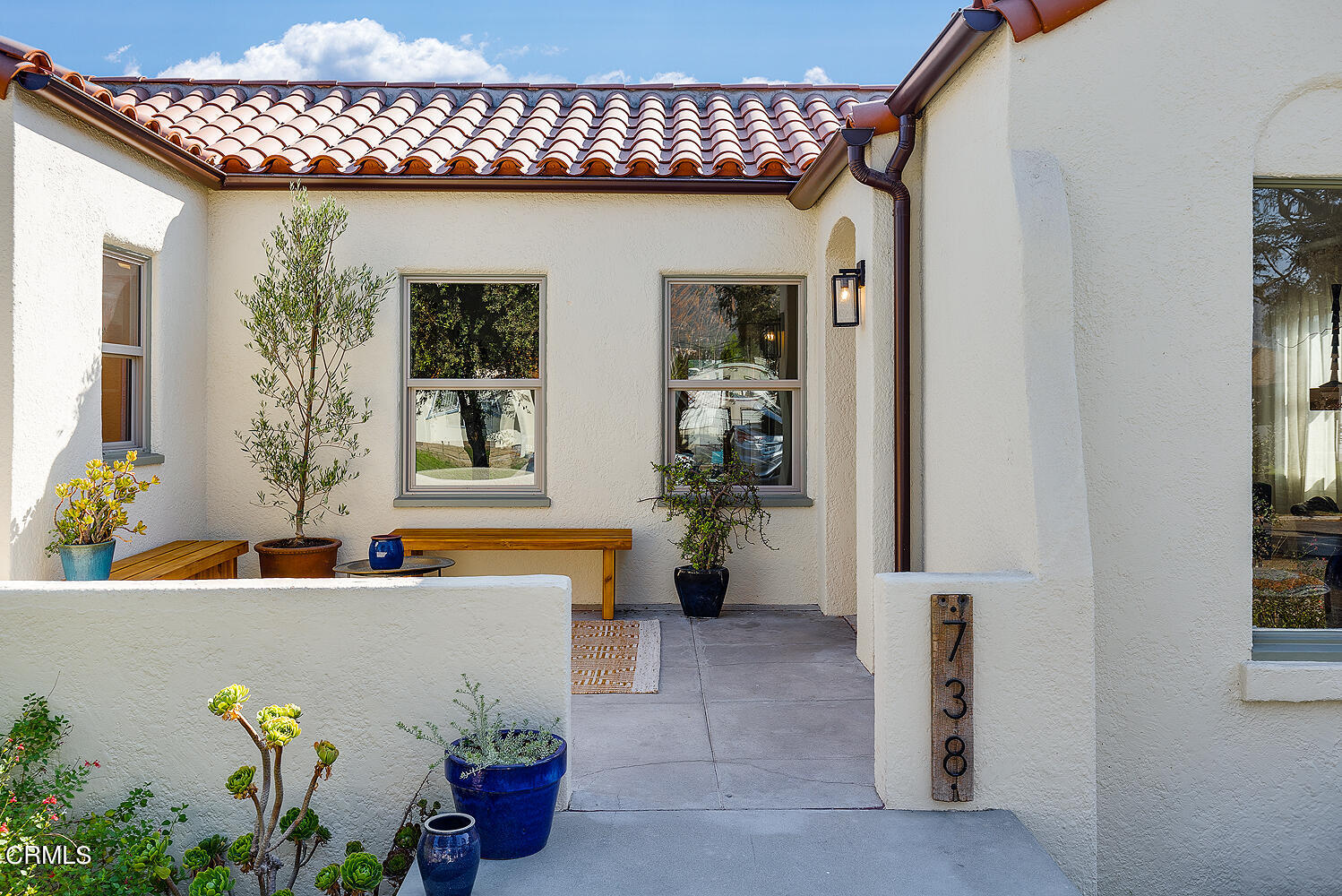 738 Burchett Street Glendale, CA 91202 - Photo 4 of 41 a bathroom with a tub and a potted plant