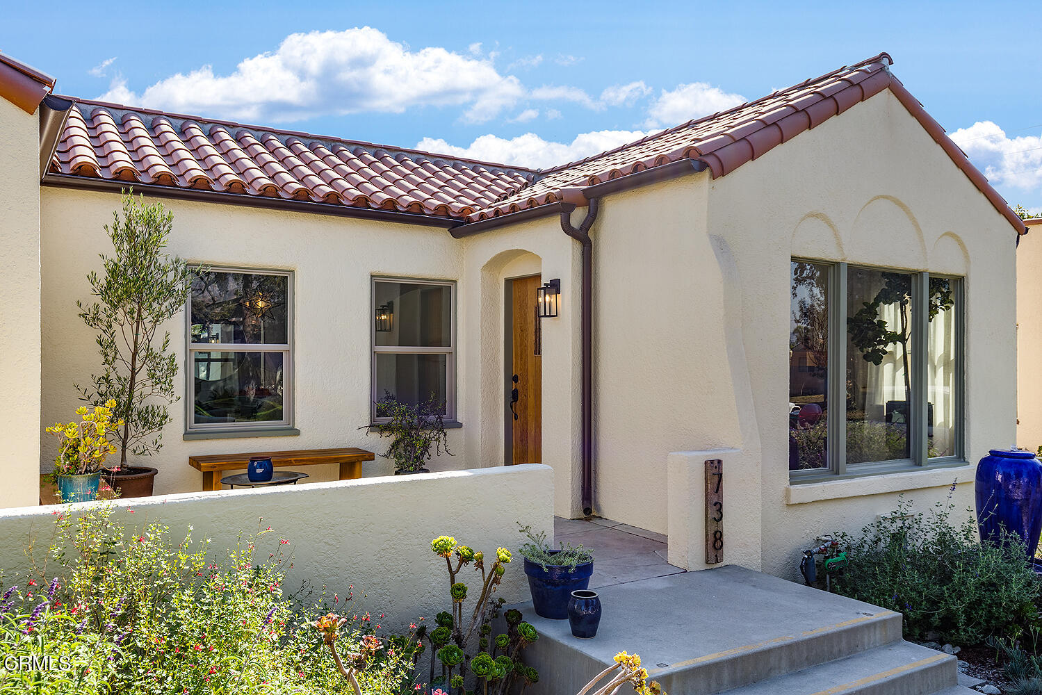 738 Burchett Street Glendale, CA 91202 - Photo 5 of 41 a front view of a house with a yard
