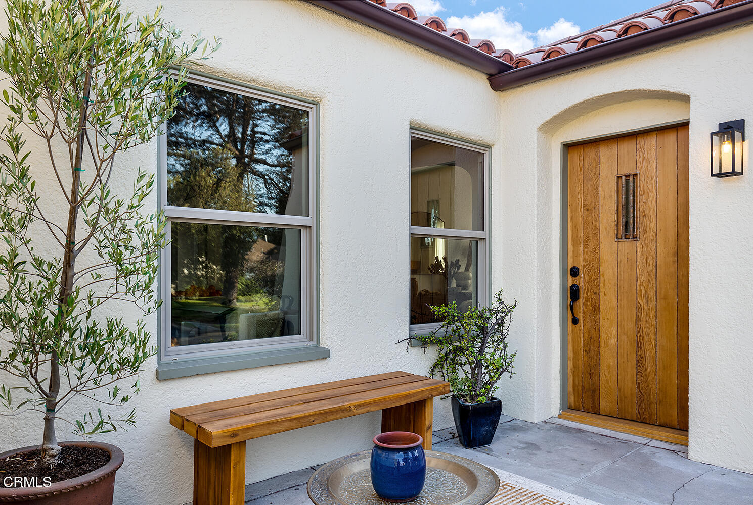 738 Burchett Street Glendale, CA 91202 - Photo 6 of 41 a table and chair in front of a house