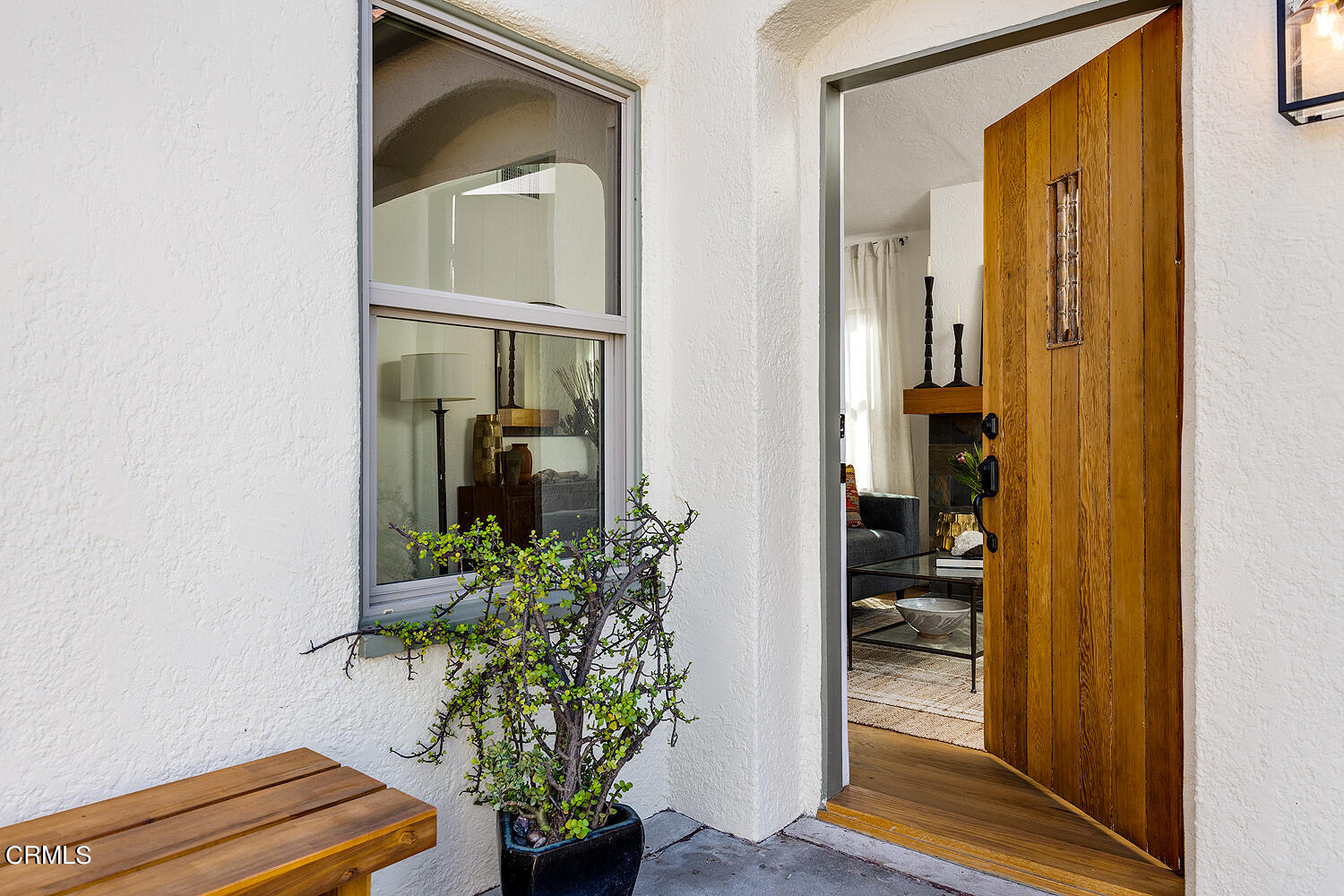 738 Burchett Street Glendale, CA 91202 - Photo 7 of 41 a room with wooden door and potted plant