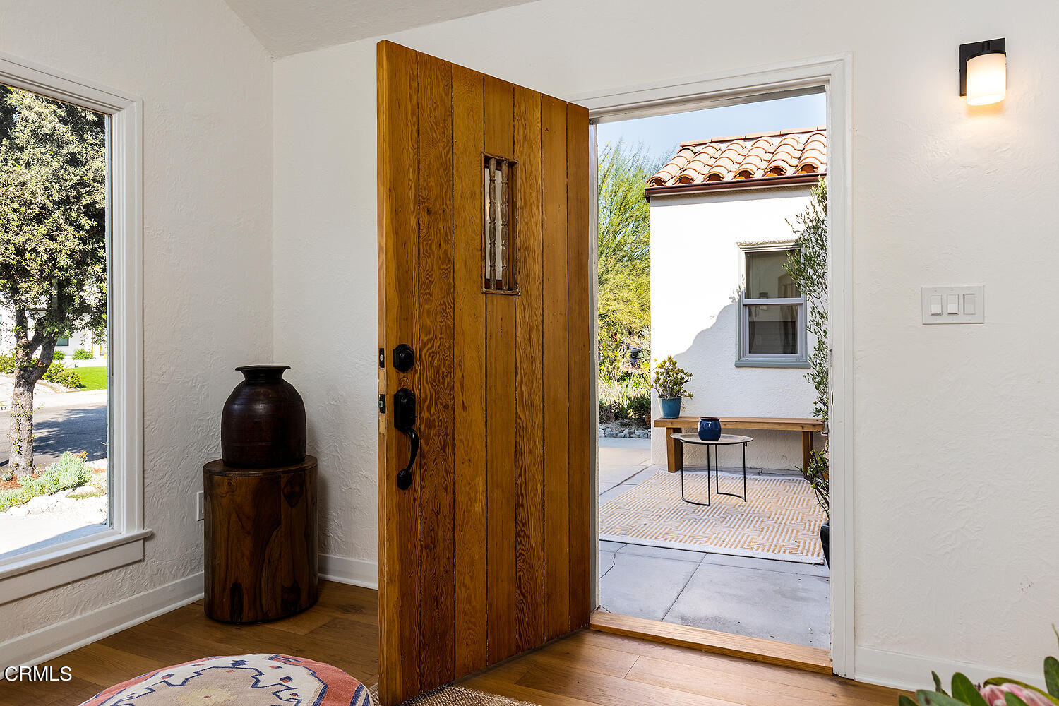 738 Burchett Street Glendale, CA 91202 - Photo 8 of 41 hallway with wooden floor and furniture