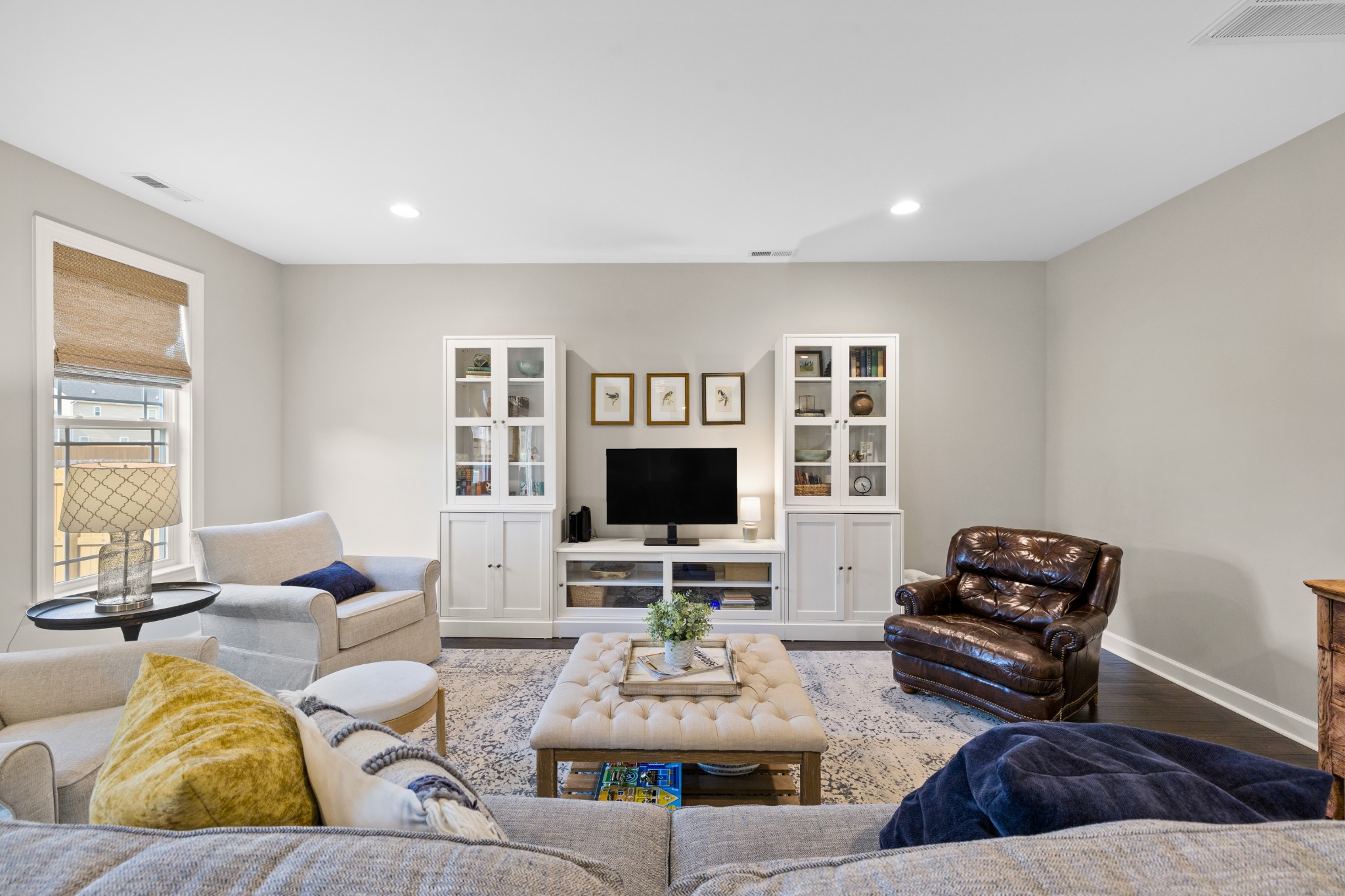 1006 Garrison Way Spring Hill, TN 37174 - Photo 16 of 46 a living room with furniture flat screen tv and a window