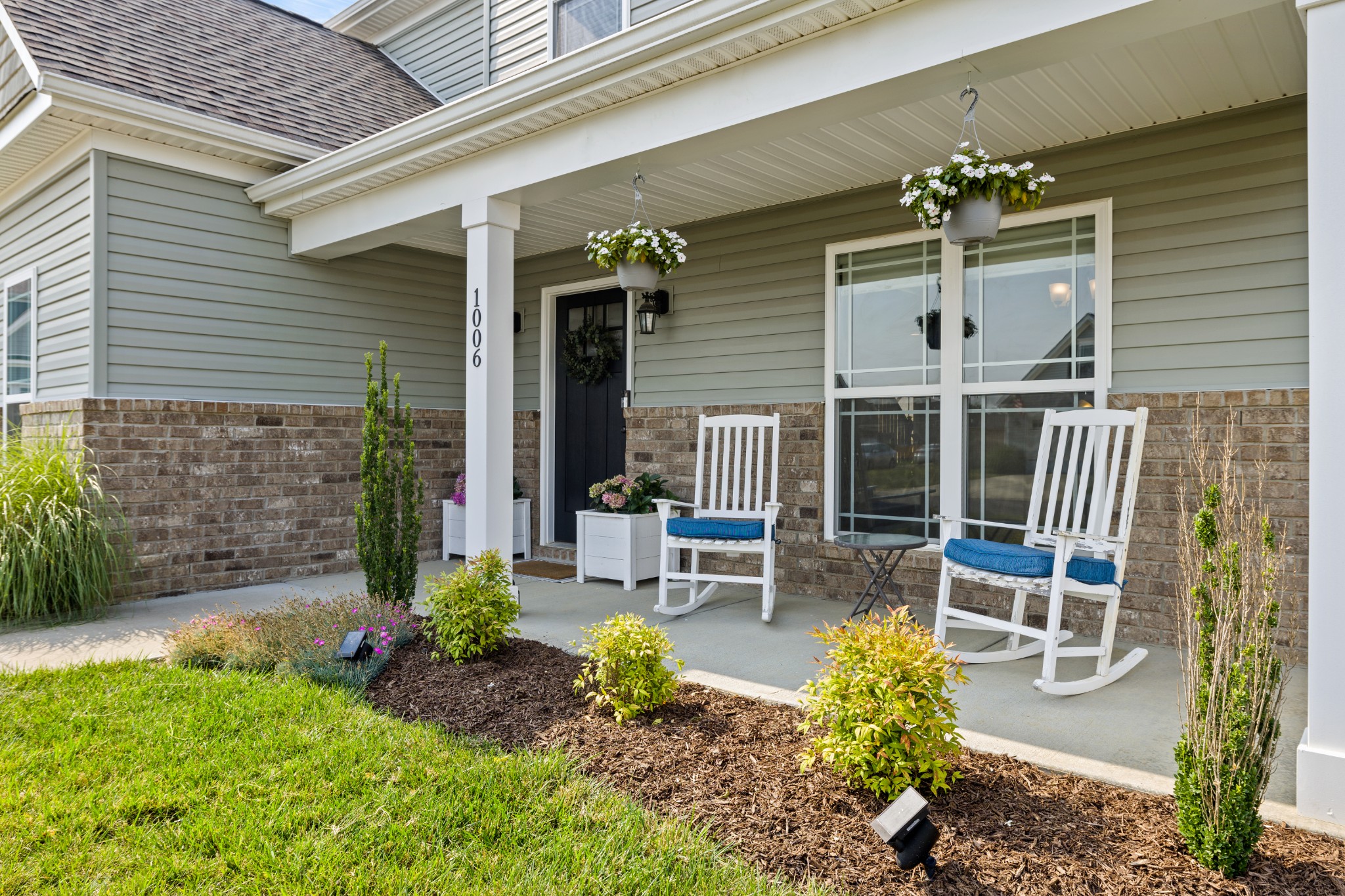 1006 Garrison Way Spring Hill, TN 37174 - Photo 2 of 46 a view of a chair and tables in the patio