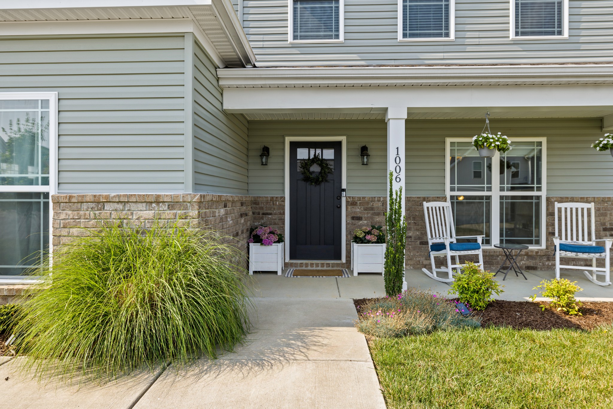 1006 Garrison Way Spring Hill, TN 37174 - Photo 3 of 46 a front view of a house having yard