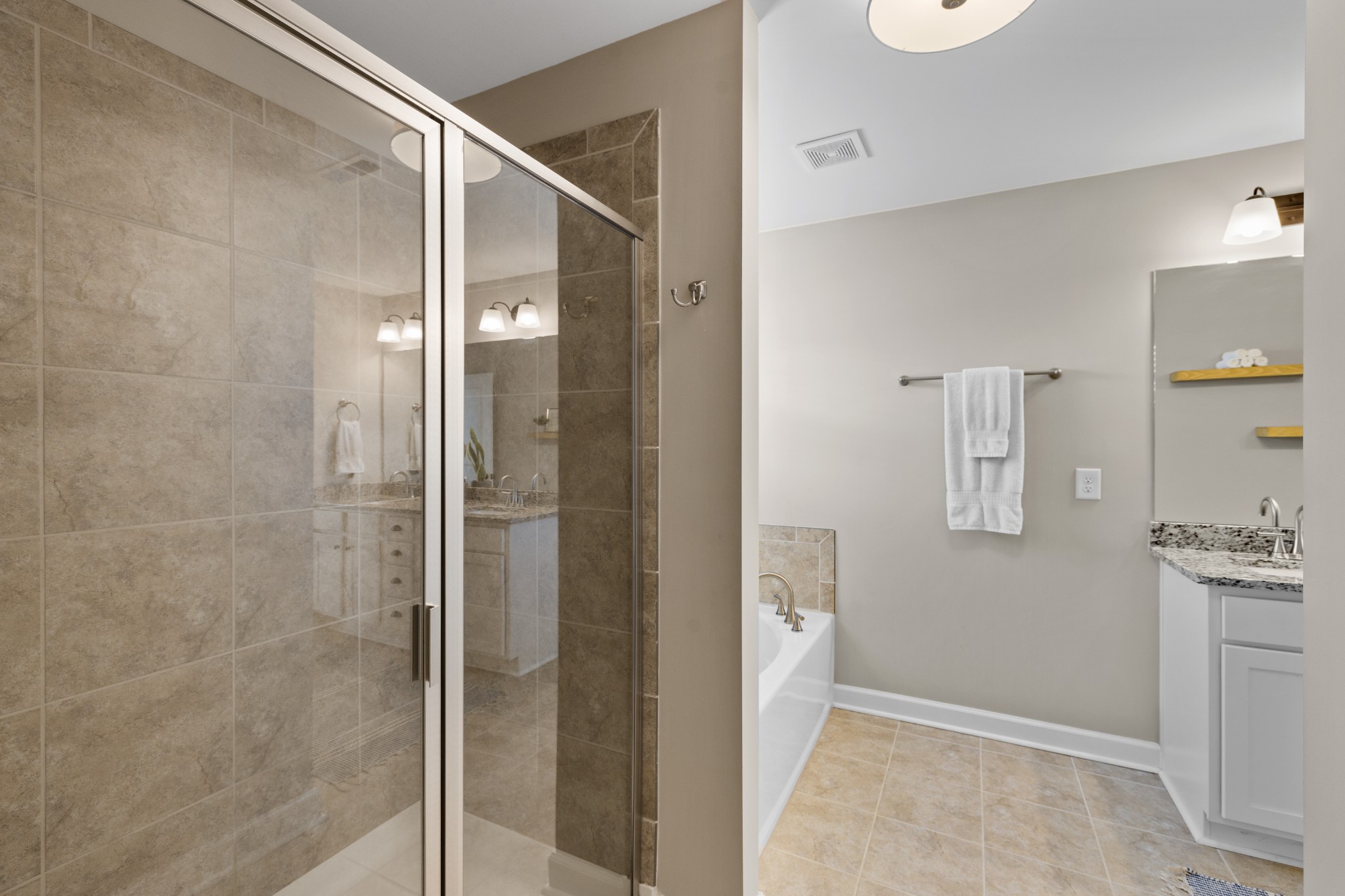 1006 Garrison Way Spring Hill, TN 37174 - Photo 31 of 46 a bathroom with a shower and a sink