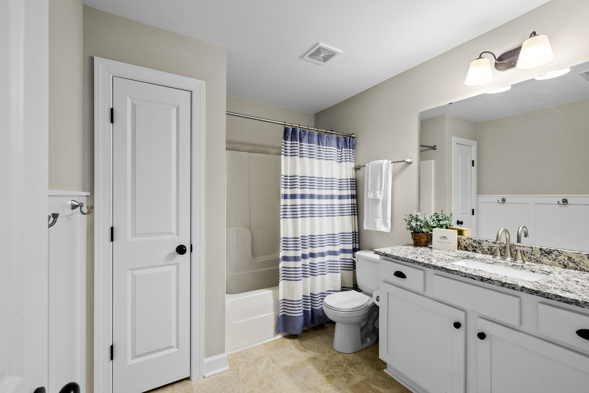 1006 Garrison Way Spring Hill, TN 37174 - Photo 37 of 46 a spacious bathroom with a shower sink and mirror