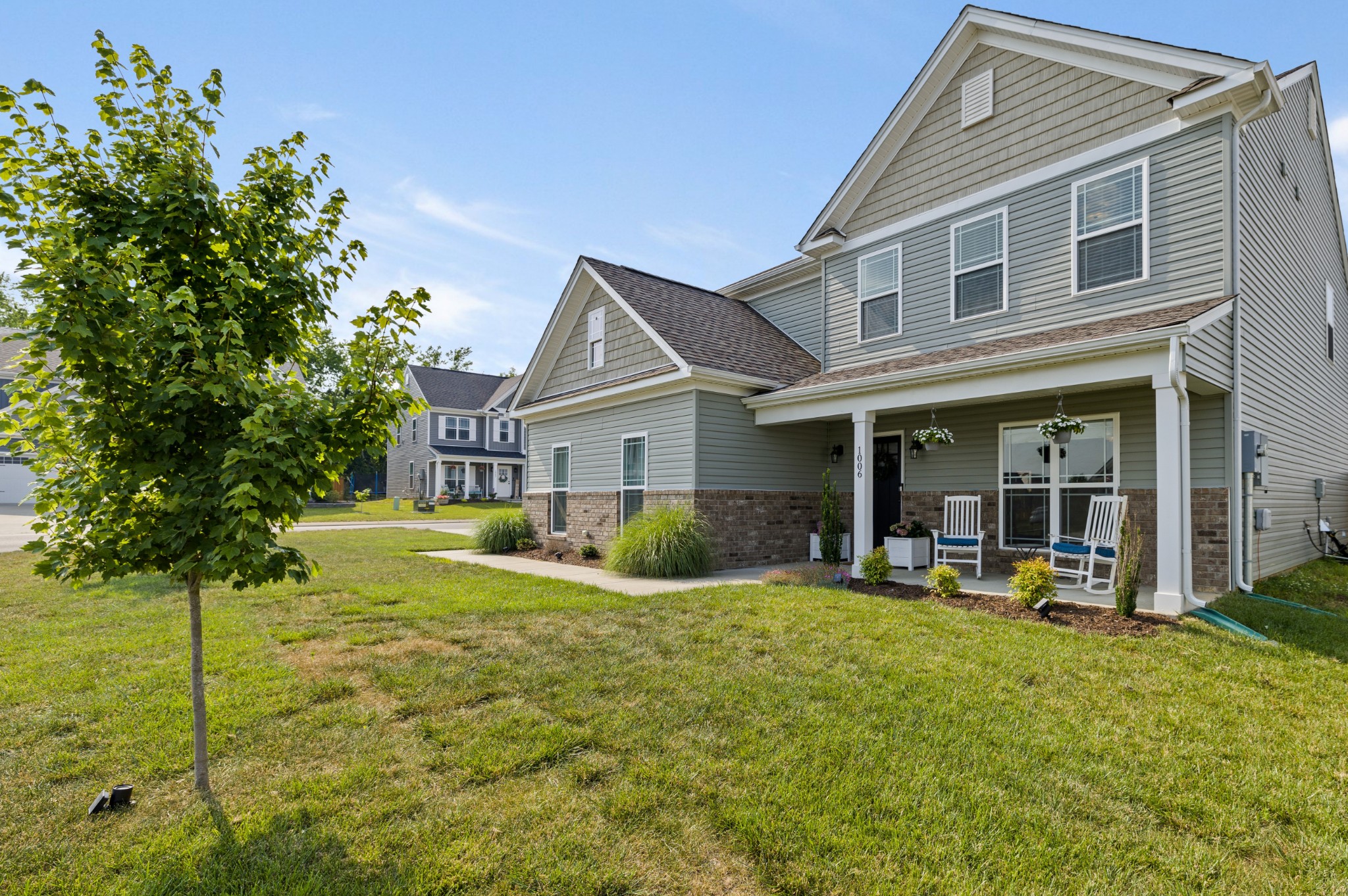 1006 Garrison Way Spring Hill, TN 37174 - Photo 4 of 46 a view of a house with a yard patio and sitting area