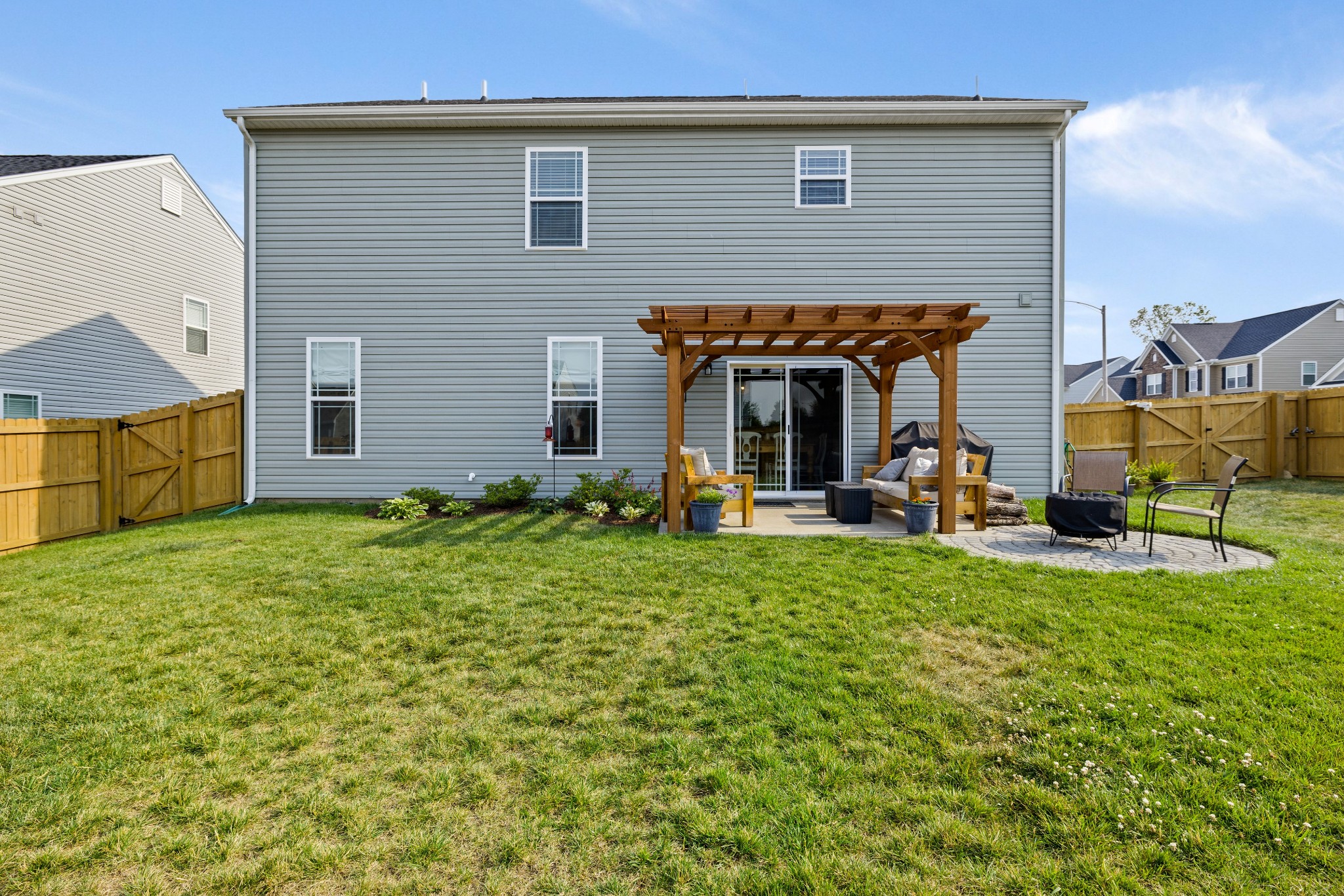 1006 Garrison Way Spring Hill, TN 37174 - Photo 44 of 46 a view of a house with a backyard