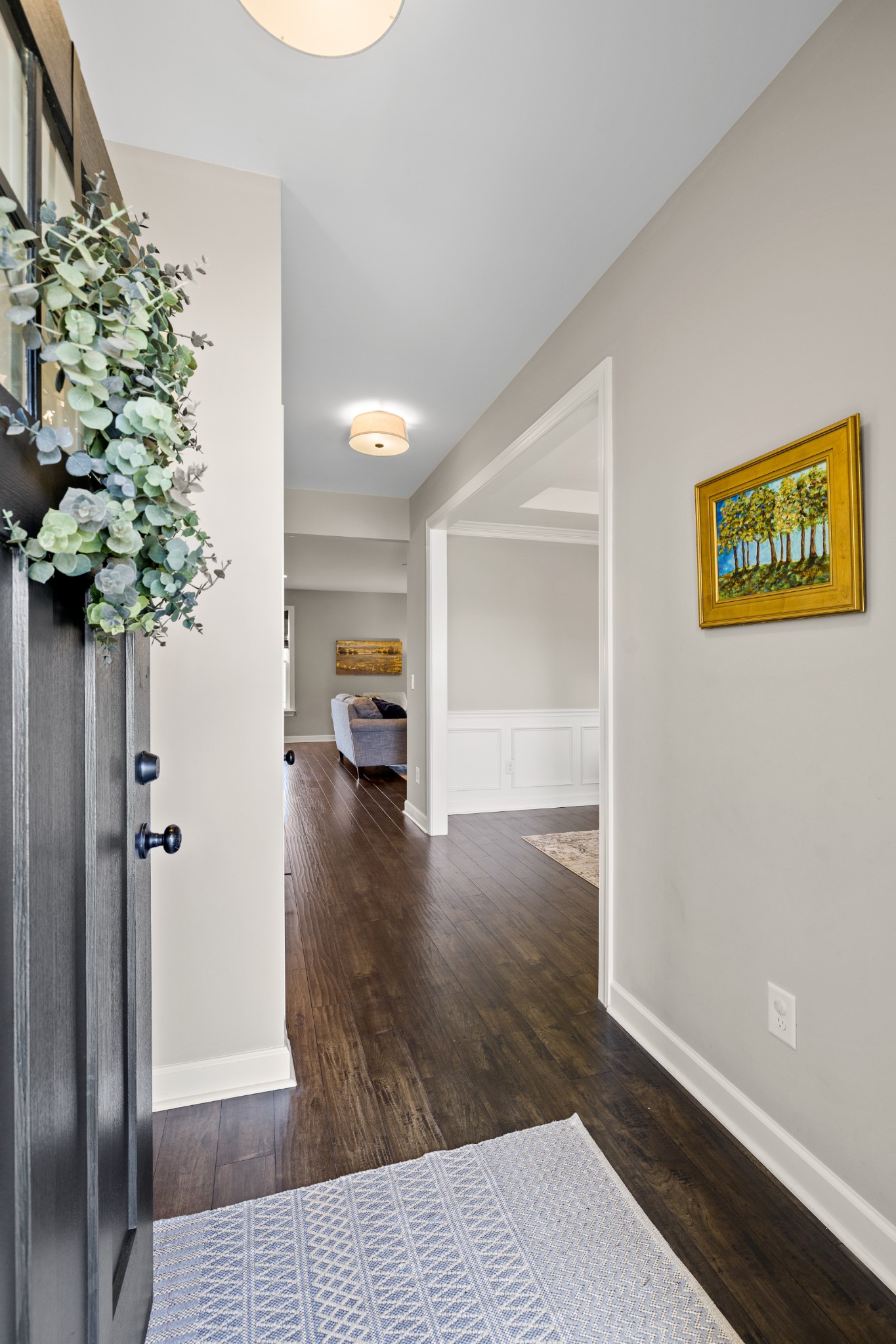 1006 Garrison Way Spring Hill, TN 37174 - Photo 7 of 46 a view of a hallway to a livingroom with furniture