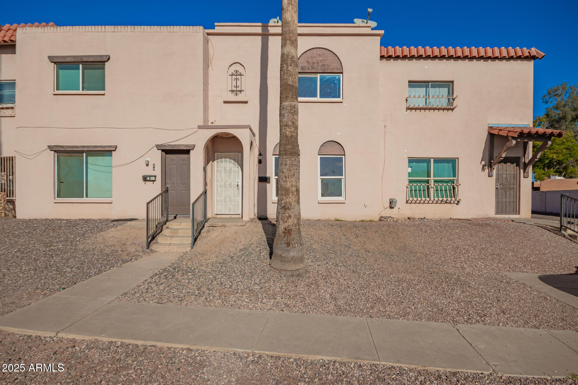 4625 West Thomas Road, Unit 43 Phoenix, AZ 85031 - Photo 1 of 26 a house view with a outdoor space