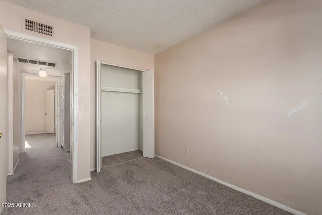 an empty room with closet