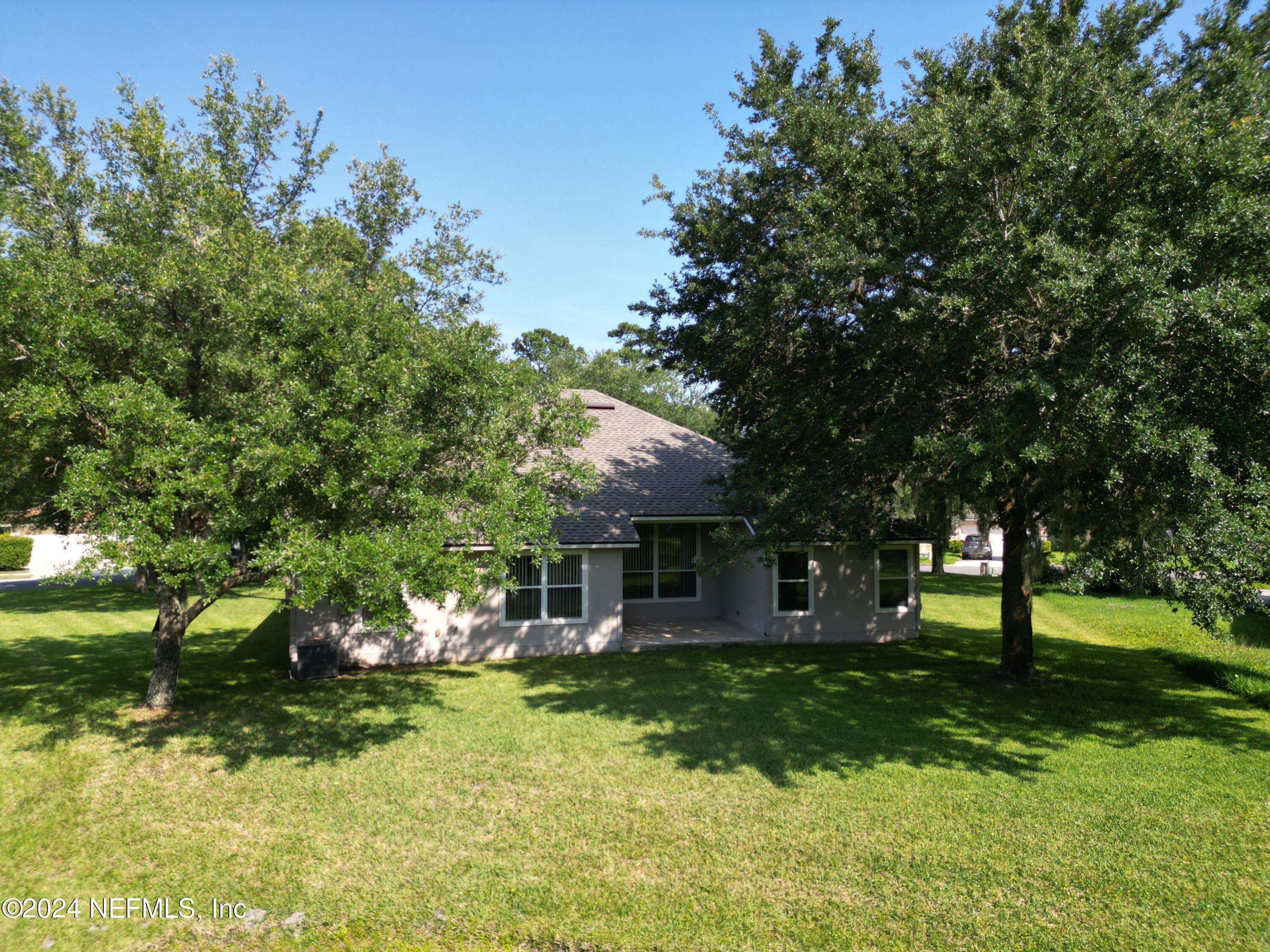 1402 Samantha Circle East Jacksonville, FL 32218 - Photo 30 of 33 a front view of a house with a yard