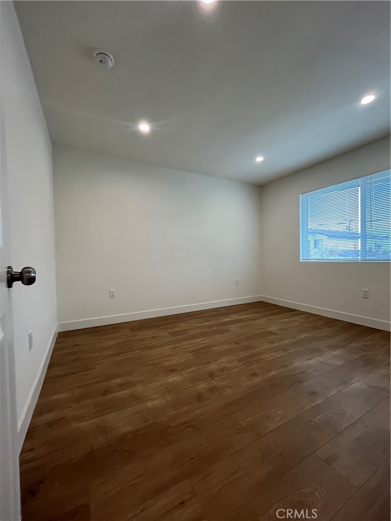 1011 East Chevy Chase Drive, Unit B Glendale, CA 91205 - Photo 8 of 11 an empty room with a empty space and window