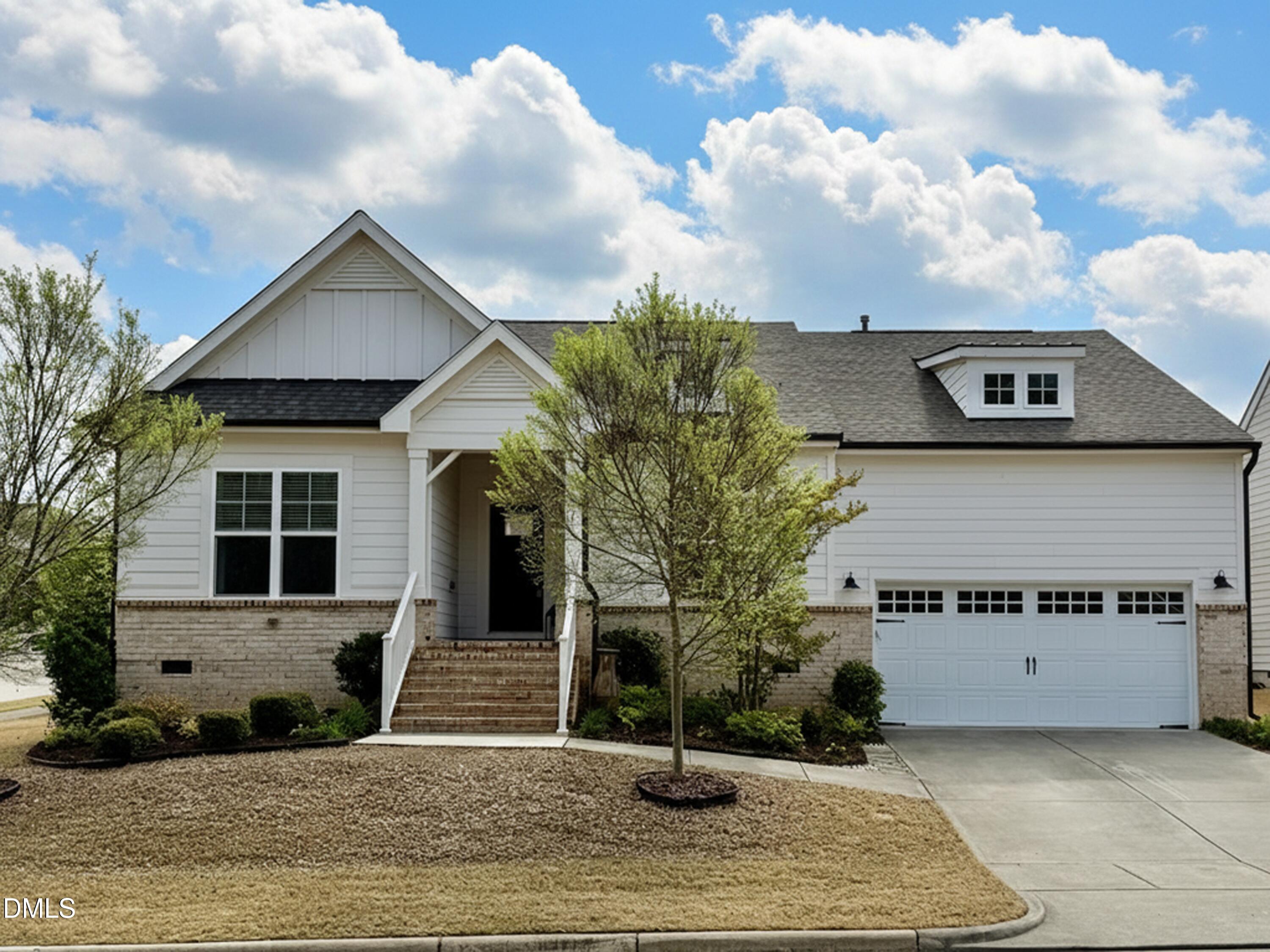 236 Oakmere Drive Cary, NC 27513 - Photo 1 of 49 a house with tree in front of it