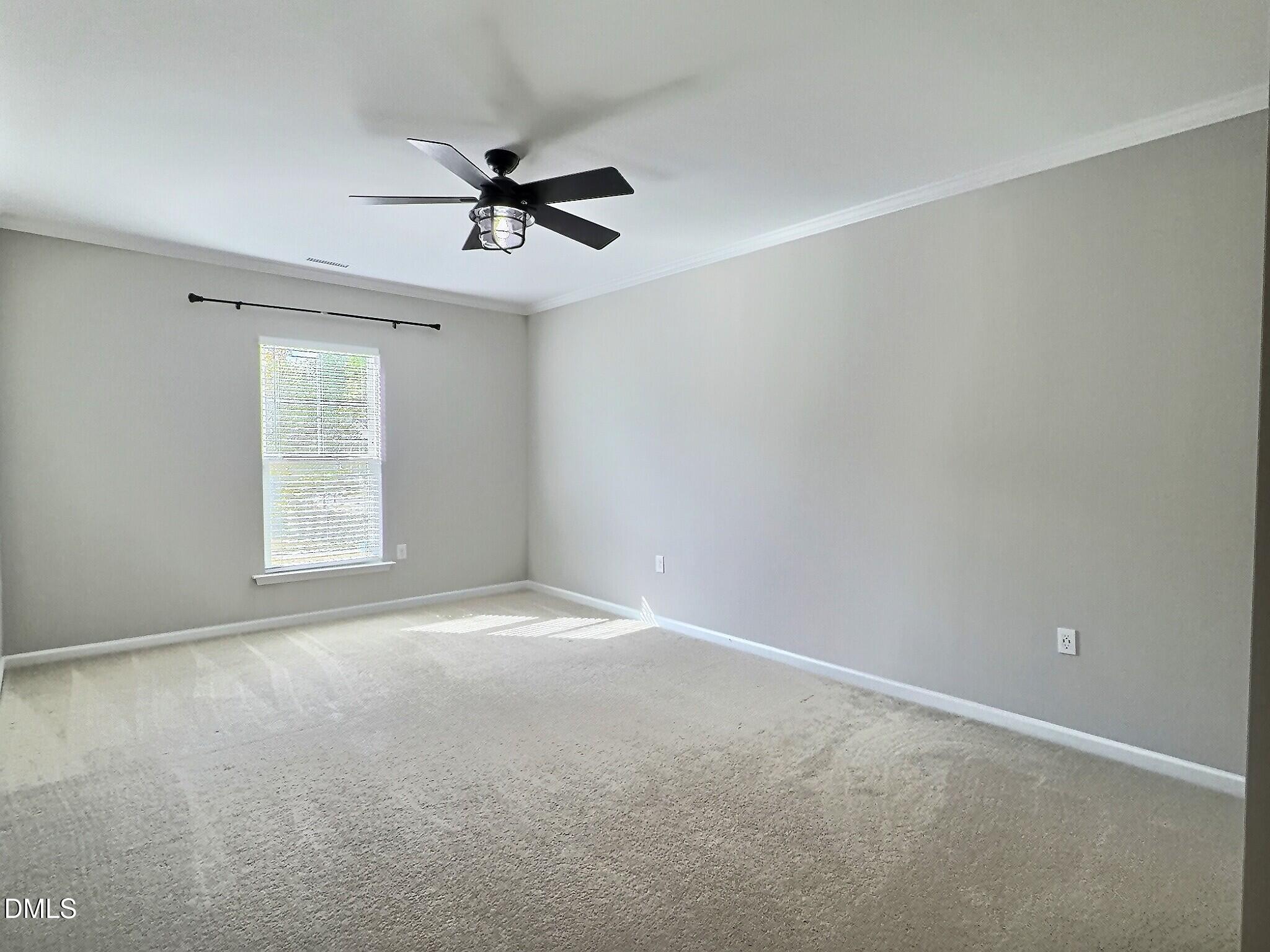 236 Oakmere Drive Cary, NC 27513 - Photo 25 of 49 a view of an empty room with a window