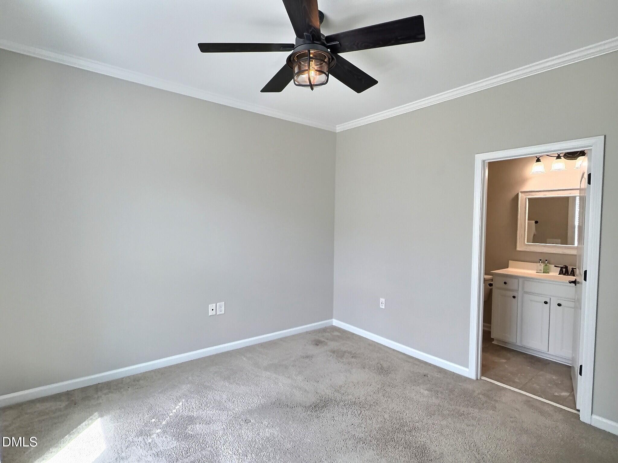 236 Oakmere Drive Cary, NC 27513 - Photo 30 of 49 an empty room with closet and windows