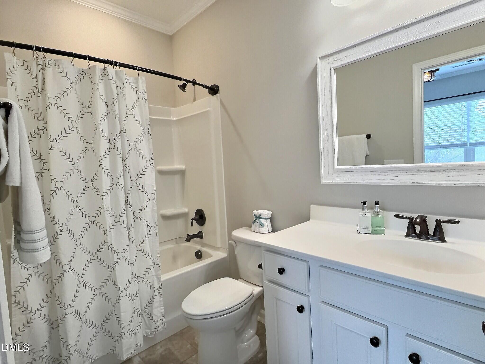 236 Oakmere Drive Cary, NC 27513 - Photo 31 of 49 a bathroom with a sink toilet and shower