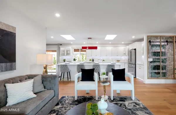 a kitchen with lots of counter top space and living room