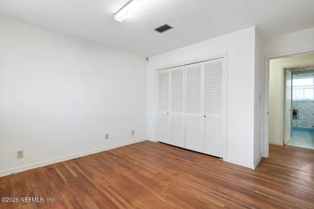 a view of a house with snow on the background