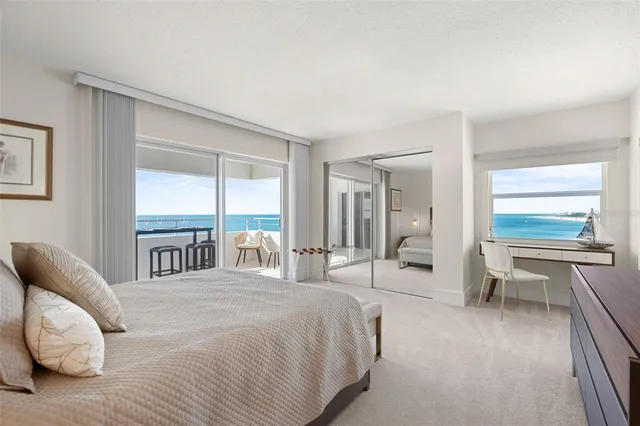 a living room with a table and a window