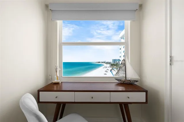 a bathroom with double vanity sinks and a mirror