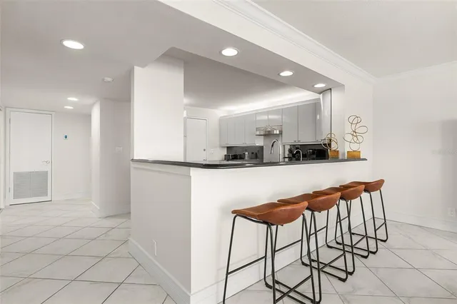 a living room with a couch and a table