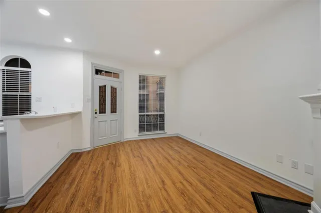 a kitchen with stainless steel appliances a stove a refrigerator and cabinets