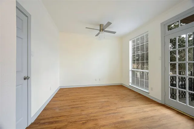 a bathroom with a sink a large mirror and shower