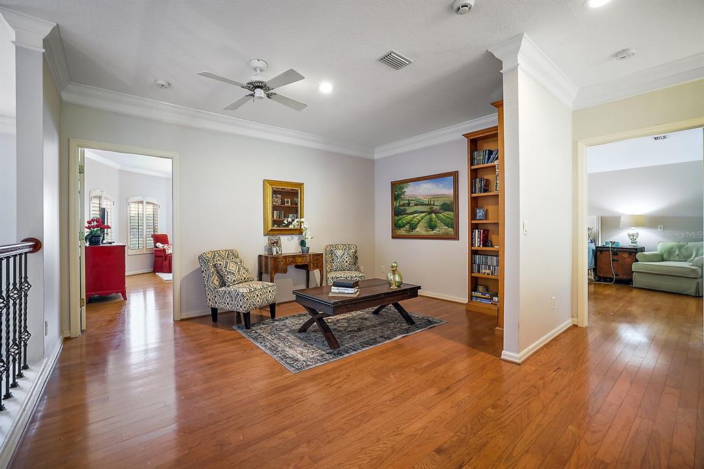 2701 Regal Point Place Eustis, FL 32726 - Photo 23 of 53 a living room with furniture and a wooden floor