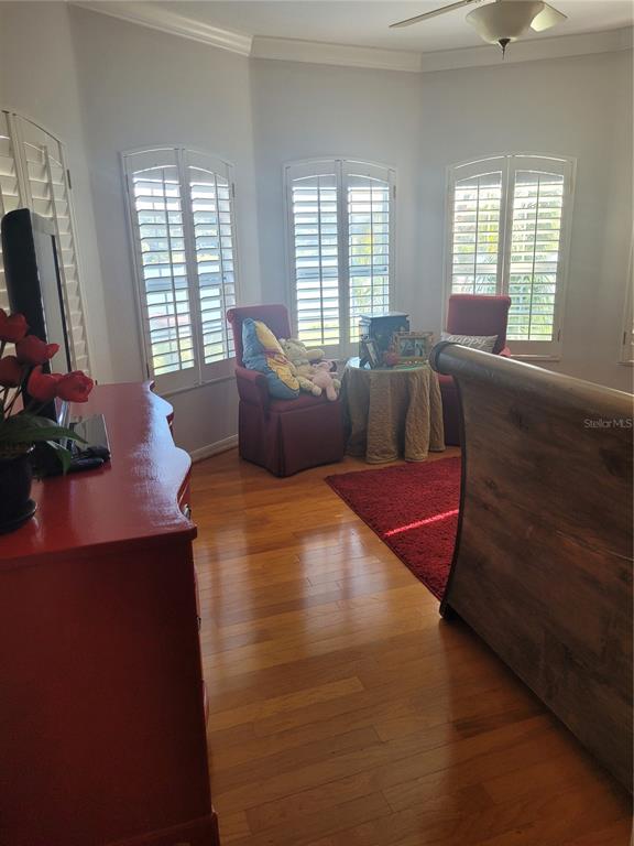 2701 Regal Point Place Eustis, FL 32726 - Photo 31 of 53 a living room with furniture and a flat screen tv